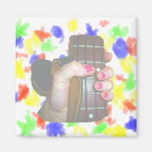 female hand holding four string bass neck faded magnet