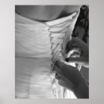 Female hand lacing up wedding dress back print