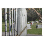 Fence at a cemetery placemat