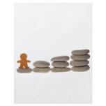 Figurine on stack of pebbles flyer