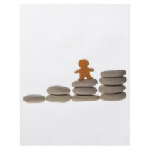 Figurine on stack of pebbles flyer design