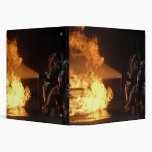 Firefighters extinguish a simulated battery fir binder