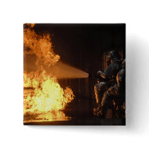 Firefighters extinguish a simulated battery fir pins