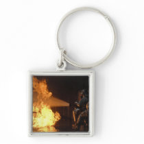 Firefighters extinguish a simulated battery fir keychain