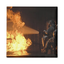 Firefighters extinguish a simulated battery fir refrigerator magnet
