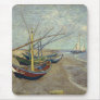 Fishing boats on the beach mousepads