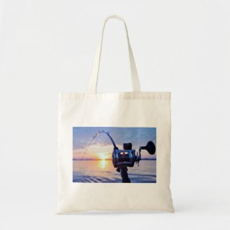 Fishing Reel at Sunset Canvas Bags