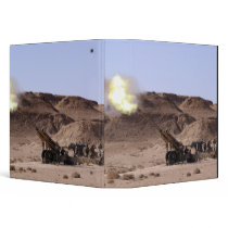 Flame and smoke emerge from the muzzle vinyl binders