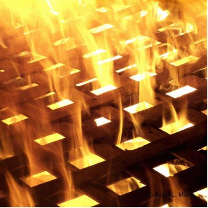 Flames of fire through a lattice photograph design acrylic cut out