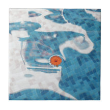 Floating Orange Spring  Flower in Blue Water Ceramic Tile