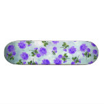 Floral patterns: purple flowers on blue bokeh skateboard
