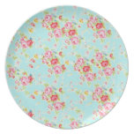 Flores color de rosa lamentables azules de los ros plato