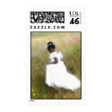flower girl in a field postage stamp