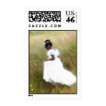 flower girl in a field postage stamp