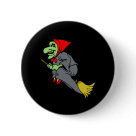 round_button - This green witch is flying on her broom with her red scarf and ruby red slippers!
If you are a witch or want to be a witch this great design is perfect for you.  Whether you are a Wiccan or Pagan, or just love to dress up as a witch for Halloween this great witch design is perfect for you.