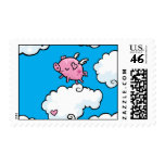 Flying pig dances on clouds stamp