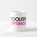 Foolish Optimist (pink smile edition) Mugs