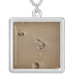 Foot steps in sand custom jewelry