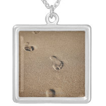 Foot steps in sand custom jewelry