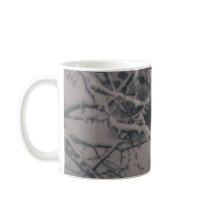 FOOTPRINTS IN THE SNOW mugs