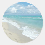 Footprints on White Sandy Beach, Scenic Aqua Blue Round Sticker