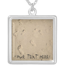 Footsteps on sand necklace