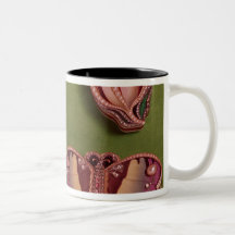 Four enamelled and jewelled boxes, butterfly mugs