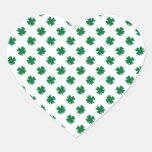 Four leaf clovers in green heart sticker