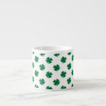 Four leaf clovers in green espresso cup