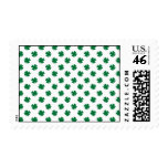 Four leaf clovers in green stamps