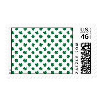 Four leaf clovers in green stamps