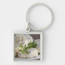 French goat cheese - chevre - with herbs on a key chains