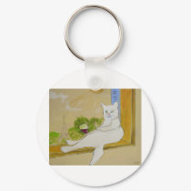 Frenchy looking at Eiffel tower keychains