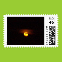 Full moon and forest fire smoke in the air postage stamps