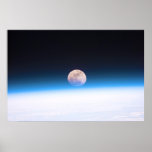 Full Moon partially obscured by atmosphere posters