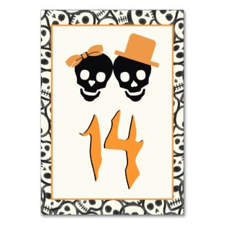 Fun skulls Halloween orange wedding table number