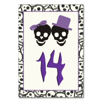 Fun skulls Halloween purple wedding table number