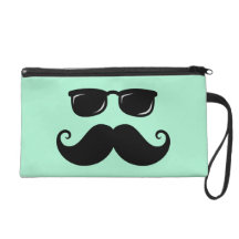 Funny mustache and sunglasses face mint green wristlet clutches