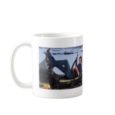 Gal Lying on a Snowmobile with Gun Mug mug