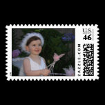 A picture of a cute little girl dressed up in a fairy costume, waving wands and casting a spell in the garden. Garden Fairy casting a spell with wands | Stamp