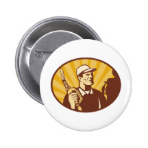Gasoline attendant with petrol pump nozzle pinback buttons