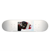 Gato que lleva la fotografía del gorra de santa, g monopatin personalizado