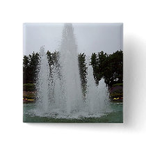 Geyser fountain surrounded by flowers pins