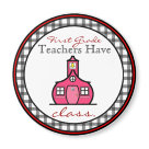 round_magnet - A magnet for teachers featuring the logo of The Pink Schoolhouse inside a circle shaped black gingham frame with red trim.  Black and red text reads "First Grade Teachers have class."
