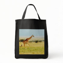 Giraffe walking Masai Mara Plains in Kenya Canvas Bags
