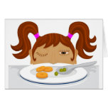 Girl deciding if she should eat her vegetables card