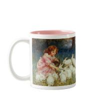Girl feeding Rabbits Mug
