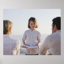 Girl reading a book in front of her parents poster
