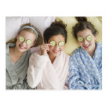 Girls having a facial post cards
