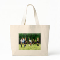 Girls Playing Soccer bags